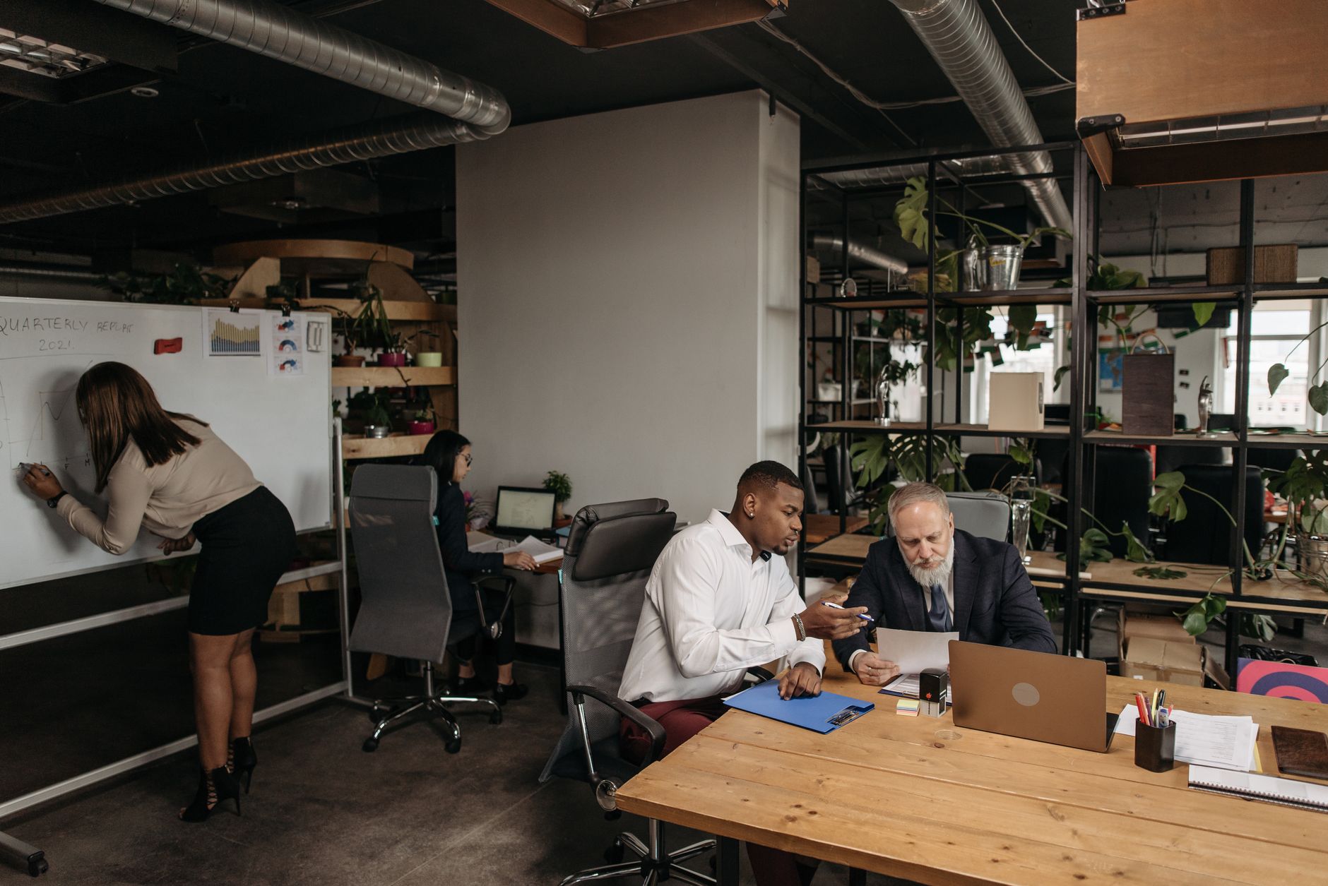 Project management portfolio review with plans and reports